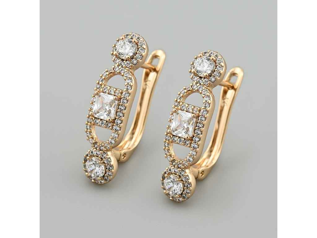 Сережки англійська застібка Трейсі 48624 25*7мм білі фіаніти 4,3г позолота 18К ТМ XUPING Сережки англійська застібка Трейсі 48624 25*7мм білі фіаніти 4,3г позолота 18К ТМ XUPING